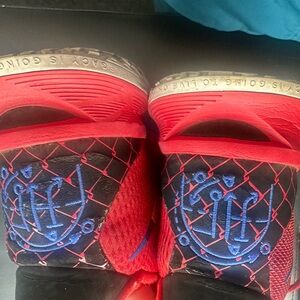 Red and Blue Athletic Shoes
#11